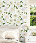 Swoon Worthy Green Floral Peel And Stick Wallpaper For Epic Boho Wall Upgrades With Chill Self Adhesive Botanics Serving Major Room Vibes And Super Easy Removable DIY Decor Rolls on bedroom wall with floral design.