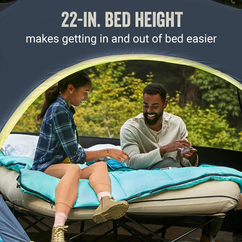 Couple sitting on Queen Size Airbed Cot With Folding Steel Frame And Side Table Battery Pump Included Portable Camping Bed