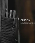 Ultra Bright LED Flashlight With Clip in mesh pocket, showing portable design and clip attachment for easy access