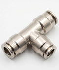 Close-up of a One Quarter Inch Push To Connect Air Line Tee Fittings Brass, showing durable construction