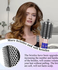 Woman using Large Round Volumizing Hair Brush Attachment for Dyson Airwrap Styling with metal gray finish