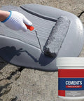 Heavy Duty Cement Patch To Fix Cracks Waterproof Flexible Concrete Repair Formula For Sidewalks Garage Floors And Foundations Delivering A Smooth Durable Finish With Zero Sweat Or Stress, being applied with a roller.