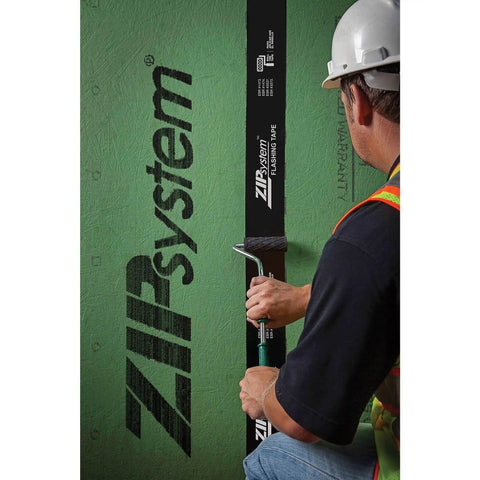 Worker applying Heavy Duty Adhesive Flashing Tape For Windows And Doors, Built Tough With Advanced Acrylic Bond