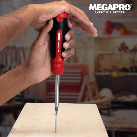 Ratcheting Screwdriver With Pullout Bit Cartridge For Easy Bit Change Red Handled Tool One Quarter Inch Hex Driver Alloy Steel Shaft Palm Saver Cap Made In Canada being used on wood