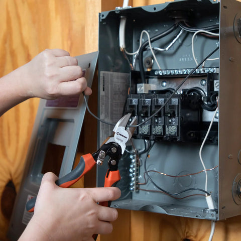 8 Inch Pro Series Diagonal Cutting Pliers With Dual Material Grips in use cutting wires in an electrical box