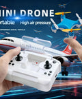 Hands holding remote for all ages mini drone for easy stunt flights with 360 degree tricks, background with airplane model