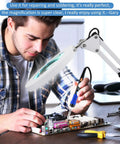 Man using 10X magnifying glass with light and stand, optical grade glass lens, three color modes and stepless dimmable, super bright adjustable swivel arm, LED desk magnifier for close work, repairs, crafts and reading, white, inspecting computer motherboard.