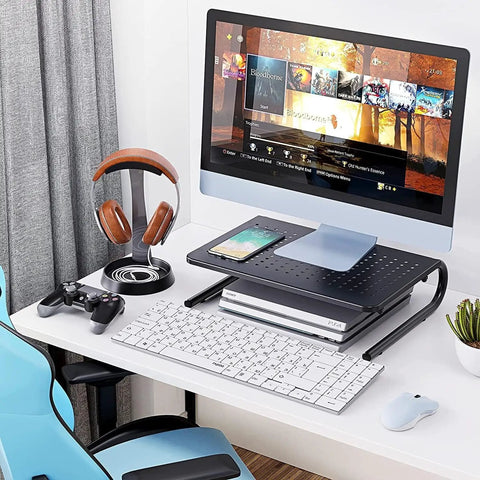 Desktop Monitor Stand With Dope Ventilated Perforated Steel Design supporting monitor on desk with keyboard and mouse