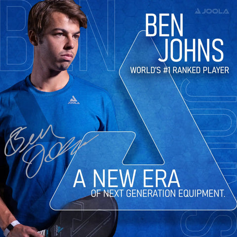 Ben Johns holding a paddle from Ben Johns Pickleball Set With Pro Grade Reinforced Fiberglass Paddles And Honeycomb Polypropylene Build