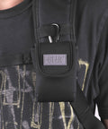 Grab And Go Coin Pouch With Belt Clip And Carabiner For Easy Access Mini Wallet Change Holder attached to a shoulder strap.