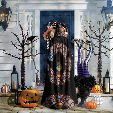 Person wearing the Halloween Adult Hooded Cape With Full Body Transfer Print For Costume Role Play Masquerade Theme Party And Carnival, Vibrant Prints, against a decorated porch with pumpkins and lanterns.