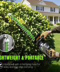 Using Cordless Hedge Trimmer 22 Inch With 21V Power No Cord Hassle Dual Action Steel Blades on garden bush near house
