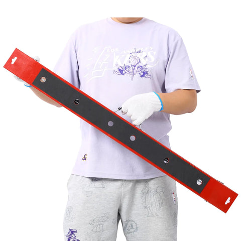 Person holding a tool with a red and black design, featured in the Heavy Duty Folding Saw Horses 2 Pack.
