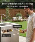 Man using Stainless Steel Outdoor Kitchen Sink With Faucet Kit Hose Hookups Single Bowl Storage Brakes On Wheels Spice Rack in yard