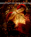 Child and adult in Santa hats holding gift, festive lights in background, caption 'Perfect Gift for Your Loved Ones'
