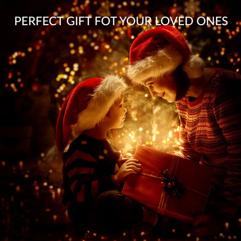 Child and adult in Santa hats holding gift, festive lights in background, caption 'Perfect Gift for Your Loved Ones'