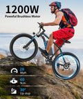 Cyclist riding All Terrain Electric Mountain Bike For Adults 1200W Peak Power Beast 28 MPH Top Speed on rocky hill