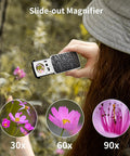 Person using All In One Jewelers Loupe Set With Illuminated Magnifiers Providing 30x 60x And 90x Three Level Zoom in nature