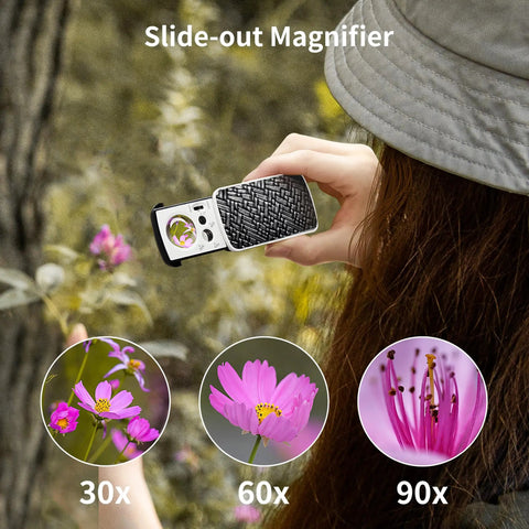 Person using All In One Jewelers Loupe Set With Illuminated Magnifiers Providing 30x 60x And 90x Three Level Zoom in nature