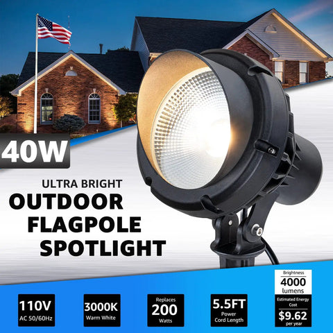 40W LED Outdoor Spotlight Plug In 120V 4000LM Warm White 3000K Landscape Lighting For Yard House Trees Flag Poles Signage With Stake And 5.5ft Cord Durable Weatherproof Design For All Seasons displayed outside a house