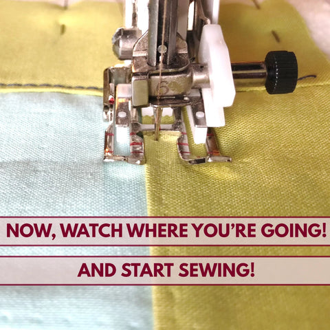 Madam Sew open-toe walking foot attached to a sewing machine, quilting through layered blue and lime fabric.