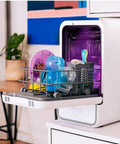 No Drama Portable Countertop Dishwasher With Dead Simple Fifteen Minute Wash Cycle Auto Dry Function Plumbing Free Setup Real Deal For Tiny Kitchens Dorm Rooms And Rv Road Trips with colorful dishes inside.