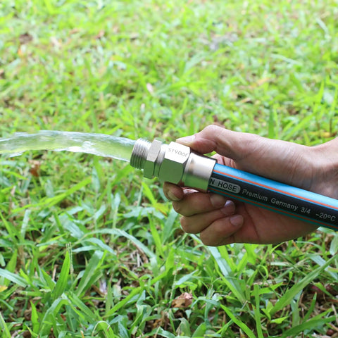 Person holding garden hose with Heavy Duty 3/4 Inch Garden Hose Repair Kit With Stainless Steel Male And Female Ends attached