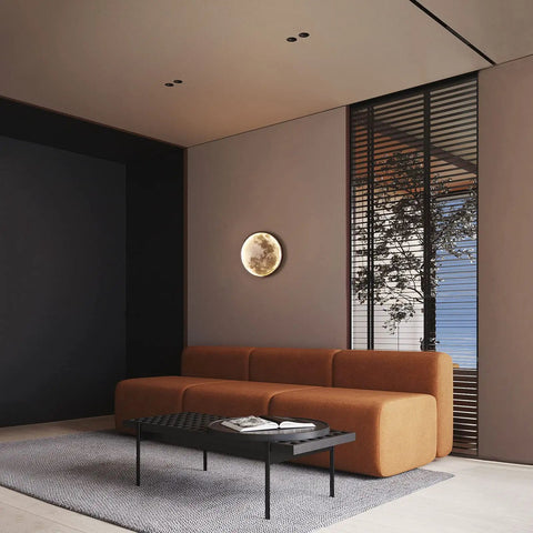 Dimmable Moon Wall Sconce With Remote, Plug-In LED Wall Light in modern living room setting, 9.5 inch black indoor wall lamp