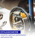 Centric Premium rear drum brake shoe set, close-up view of brake shoes and hub on vehicle axle