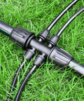Barbed Tee One Half Inch To One Quarter Inch Drip Irrigation Fittings Kit, Ten Piece Set For One Half Inch Tubing connectors in grass