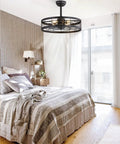 Dope Industrial Caged Ceiling Fan With Light And Remote 22 Inch Black Farmhouse Fixture installed in a bedroom setting