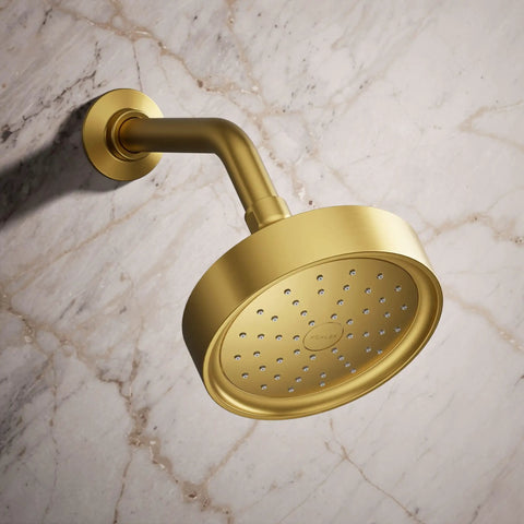 Purist Single Function Shower Head 1.75 GPM Vibrant Brushed Moderne Brass Finish Durable Plastic Construction on marble wall