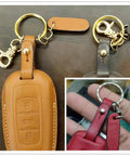 Top Shelf Built Tough Solid Brass Button Studs And Chicago Screws Includes 12 Sets Of 6Mm Round Head Leather Rivets Killer For Belt Wallet Repairs And Custom Crafts Shiny Silver Hardware Kit keychain with gold clip, brown leather, and round keyring.