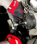 Person using AC Clutch Tool Kit For Ford GM Chrysler Removes And Installs Pressed On Clutches And AC Compressor Clutch Kit
