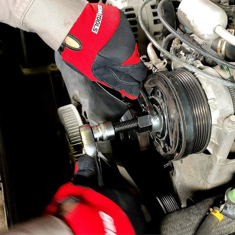 Person using AC Clutch Tool Kit For Ford GM Chrysler Removes And Installs Pressed On Clutches And AC Compressor Clutch Kit