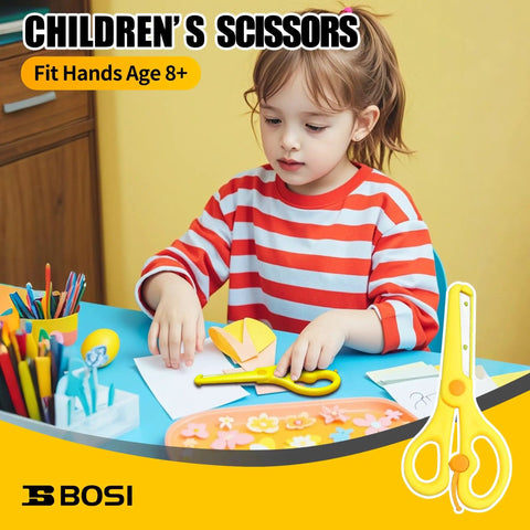 Child using BOSI children's scissors on craft project at desk with paper and pencils, suitable for ages 8 and up.