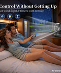 Couple using Portable Camping Fan With Light And Remote in RV, showing oscillating battery powered tent fan with remote