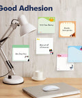18 Pack Dog Themed Sticky Notes With Lines, 35 Sheets Each, 630 Total Sheets displayed on a wooden desk with a lamp