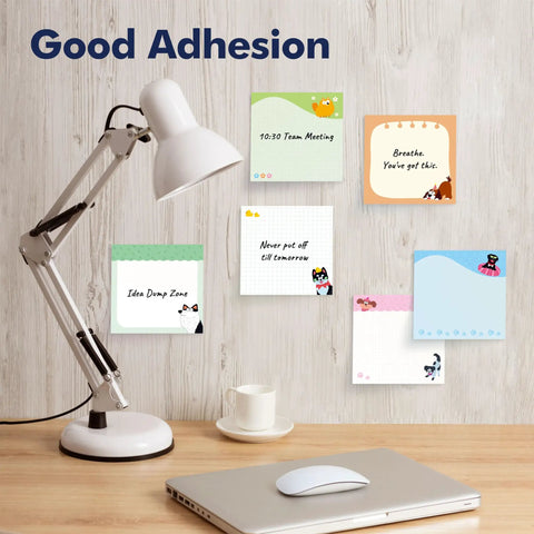 18 Pack Dog Themed Sticky Notes With Lines, 35 Sheets Each, 630 Total Sheets displayed on a wooden desk with a lamp