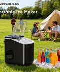 Portable Countertop Ice Maker With Handle Serving Up Fresh Bullet Ice In Under Ten Minutes Delivering Twenty Six Pounds Daily For Dead Legit Party Vibes And Summer Chills outdoors next to drinks and people.