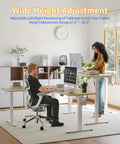 Game Changer L Shaped Standing Desk With Electric Height Adjustment, 63 By 55 Inch Reversible Corner Workspace, Natural Finish in use with two users.