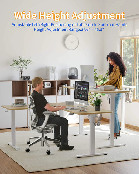 Game Changer L Shaped Standing Desk With Electric Height Adjustment, 63 By 55 Inch Reversible Corner Workspace, Natural Finish in use with two users.