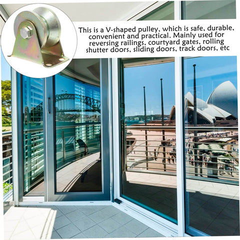 View of V-shaped pulley beside sliding glass doors with a cityscape background, showing potential applications for use in track doors.