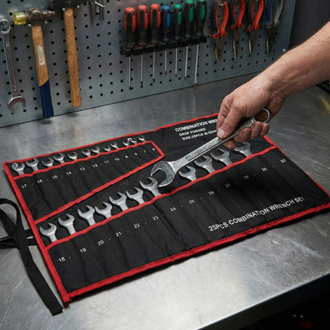 25-Piece Double Ended Wrench Set With Canvas Roll Bag In Beefy High Carbon Steel For Auto Repair, Home Maintenance, Garage Jobs, Plumbing And DIY Projects displayed open on a workbench.