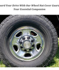 24Pcs Wheel Lug Nut Covers M27x2.0 Bolt Caps on truck wheel, showing protective caps and upgraded car style, 1.56 inch tall.