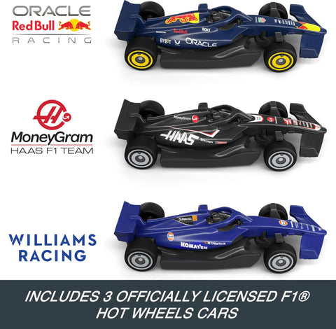 Three die-cast Formula 1 cars from Red Bull, Haas, and Williams with team logos. Formula 1 Grand Prix Circuit Track Set With 3 Die Cast 1 To 64 Scale Cars Two Racing Modes And A Motorized Booster For Totally Sick High Speed Laps Elevating Turns And Endless Track Action For Young Racers.