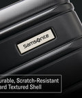 Samsonite Omni 2 24-inch hardside luggage, Arctic Silver, textured polycarbonate shell with metal logo plate