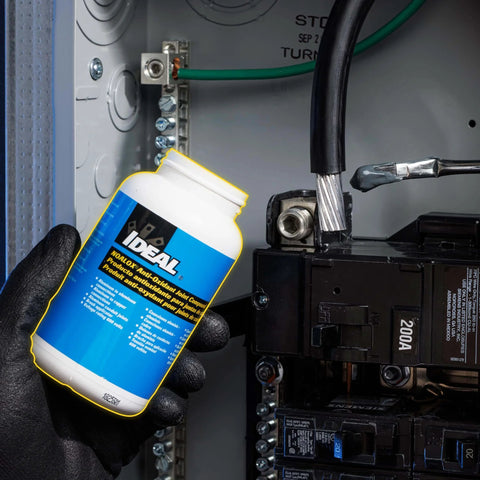 Noalox Heavy-Duty Pro-Grade Anti-Oxidant Compound For Aluminum Electrical Connections, 8 Oz Bottle in use on panel