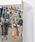 Close-up of Pro Grade Dual Boiler Espresso Maker With PID Precision Tuning, featuring chrome levers and wood handles.