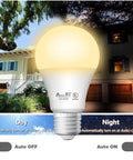 Dusk To Dawn LED Sensor Light Bulbs 4 Pack A19, UL Listed, Automatic On Off, 800 Lumens with day-night comparison, house background